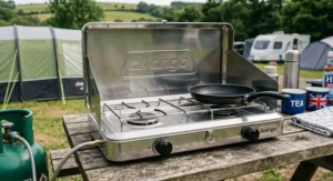 An easy-to-clean stainless steel tabletop double burner camping stove after a successful outdoor meal.