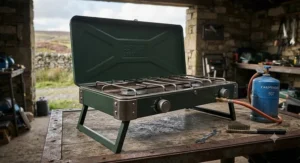 Durable steel construction of a freestanding double burner camping stove designed for rugged UK outdoor conditions.