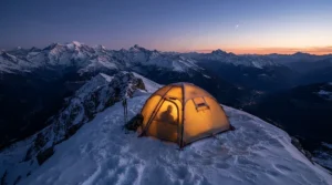 A tent pitched on an exposed ridge, demonstrating how isobutane canisters for high altitude perform in sub-zero temperatures.